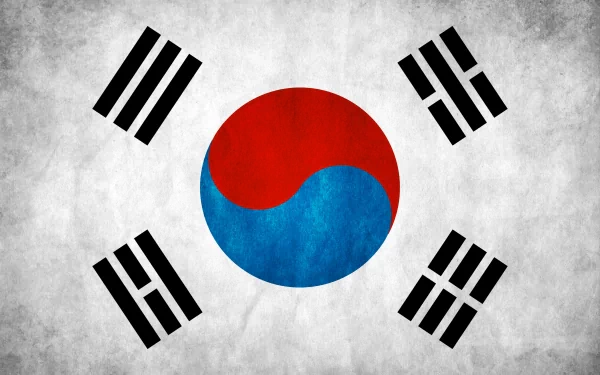 A high-definition desktop wallpaper featuring the flag of South Korea, showcasing the iconic yin-yang symbol in red and blue, surrounded by black trigrams on a textured background.