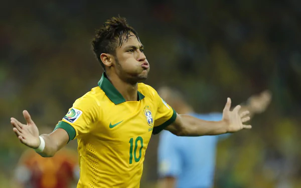Neymar in Brazil's yellow soccer jersey celebrating on the field, captured in a vibrant HD desktop wallpaper.