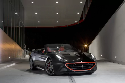 Black Ferrari California T by Tailor Made, convertible sports vehicle with red accents parked under modern lights — 4K Ultra HD PC desktop wallpaper.