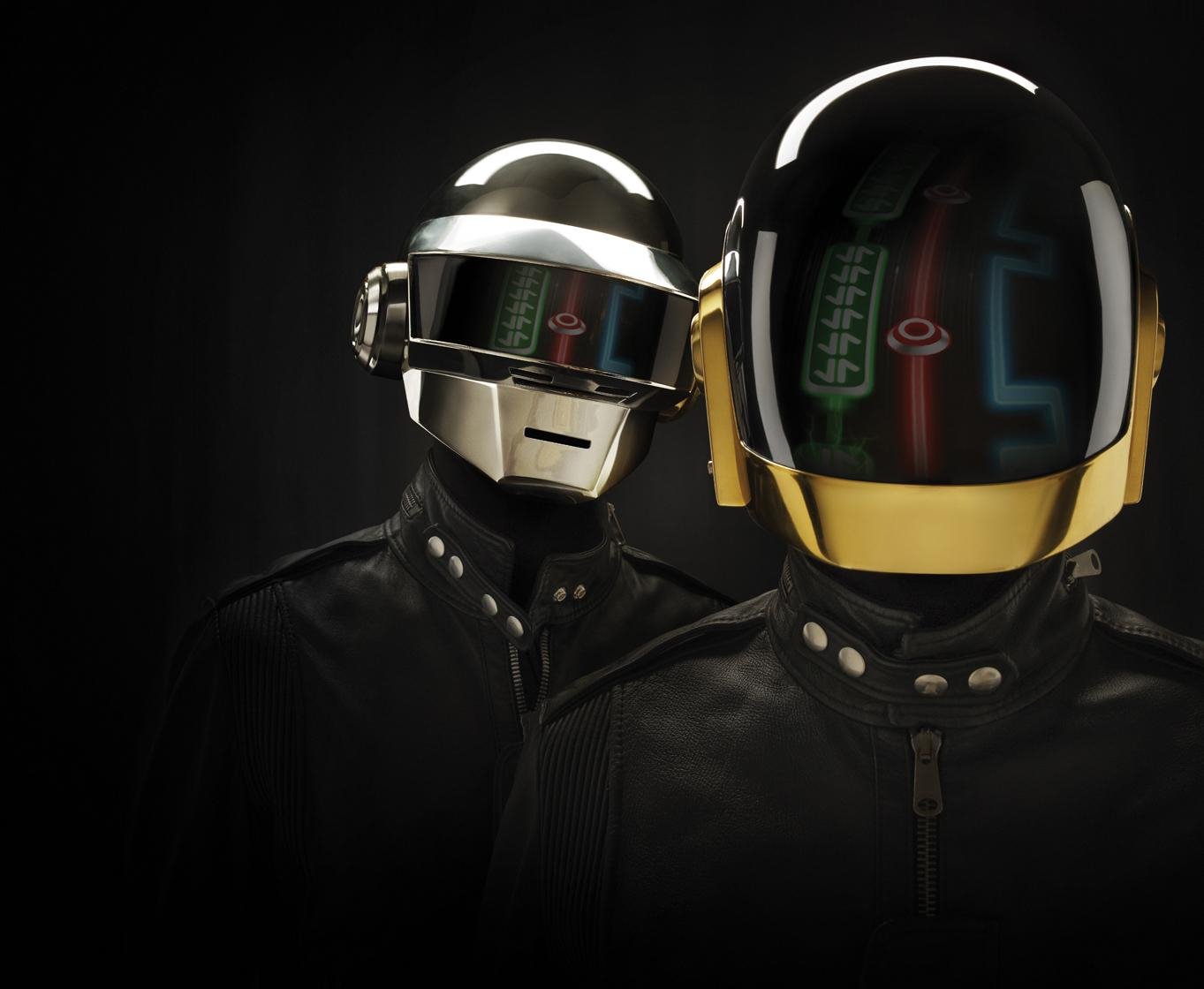 HD wallpaper featuring Daft Punk in their iconic helmets, tagged with dj hero and music. The dark background highlights their distinctive futuristic look.