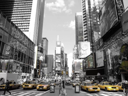 HD PC desktop wallpaper: Times Square, Manhattan - black-and-white cityscape with yellow taxis and towering man-made skyscrapers in New York.
