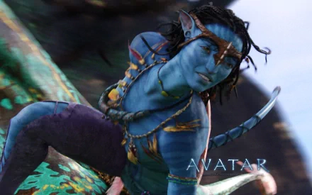 Avatar movie character wallpaper for HD desktop, featuring a Na'vi with blue skin, intricate tribal markings, and keen eyes against a blurred background.