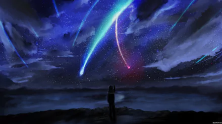 A HD desktop wallpaper featuring Mitsuha Miyamizu from the anime Your Name. gazing at a mesmerizing sky lit up by colorful comets against a backdrop of stars and clouds.