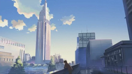 Anime cityscape from 5 Centimeters per Second showcasing a prominent skyscraper under a clear blue sky with scattered clouds, in HD resolution, designed as a desktop wallpaper.
