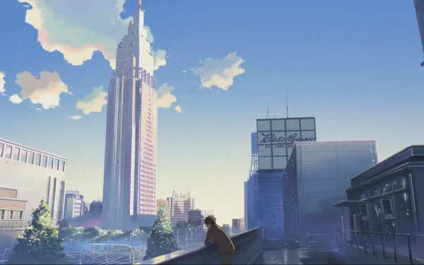 Anime cityscape from 5 Centimeters per Second showcasing a prominent skyscraper under a clear blue sky with scattered clouds, in HD resolution, designed as a desktop wallpaper.