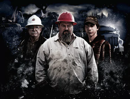 HD desktop wallpaper featuring three miners from a Gold Rush theme, with mining equipment in the background.