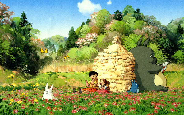 HD anime desktop wallpaper featuring Satsuki Kusakabe, Mei Kusakabe, Totoro, and Mini Totoro from My Neighbor Totoro in a vibrant, flower-filled forest scene.