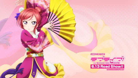 HD PC desktop wallpaper featuring Maki Nishikino from the anime Love Live!, dressed in a vibrant pink kimono holding a yellow fan against a soft pink background.