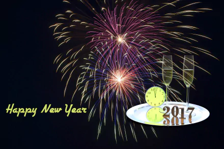 HD desktop wallpaper depicting New Year 2017 celebration with fireworks, a clock nearing midnight, champagne glasses, and the text Happy New Year against a dark background.