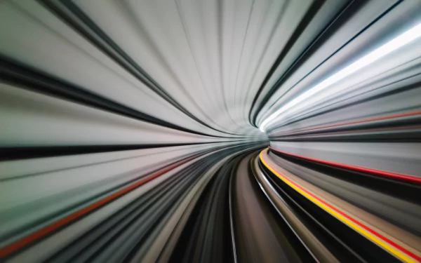 HD desktop wallpaper featuring a man-made tunnel with dynamic motion blur, creating a sense of speed and depth.