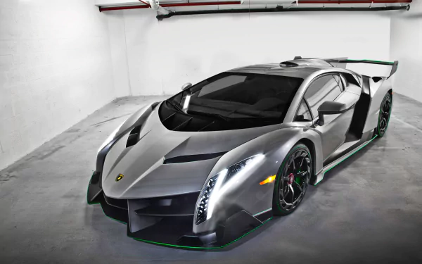Silver Lamborghini Veneno supercar with sleek aerodynamic design parked in a minimalist garage, showcased as an HD PC desktop wallpaper and background.