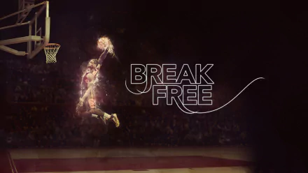HD wallpaper of a dynamic basketball play with the text BREAK FREE, capturing the essence of an impressive leap towards the basket.