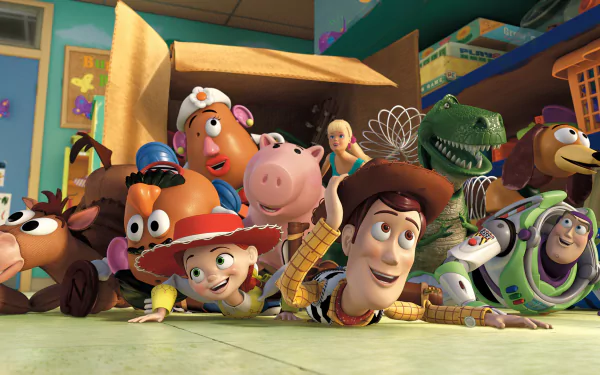 HD PC desktop wallpaper featuring main characters from the movie Toy Story 3, including Woody, Buzz Lightyear, Jessie, and others peeking out of a box.
