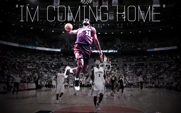 HD desktop wallpaper featuring a dynamic action shot of a basketball player on the court with the caption I'M COMING HOME.