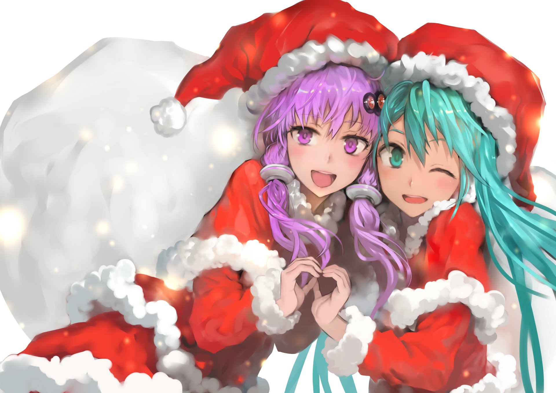 Anime-style 4K Ultra HD PC wallpaper featuring Vocaloid characters Yuzuki Yukari and Hatsune Miku dressed in festive red Santa outfits with a large snowball backdrop.