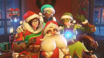 Christmas-themed Overwatch HD wallpaper featuring Torbjörn, Tracer, Lúcio, and Mei in festive outfits, posing together joyfully.