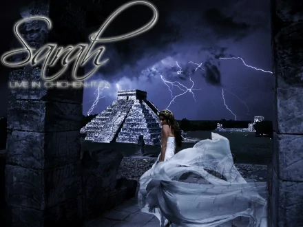 HD PC desktop wallpaper featuring Sarah Brightman with a dramatic nighttime scene of an ancient pyramid illuminated by lightning, blending music and mystique.