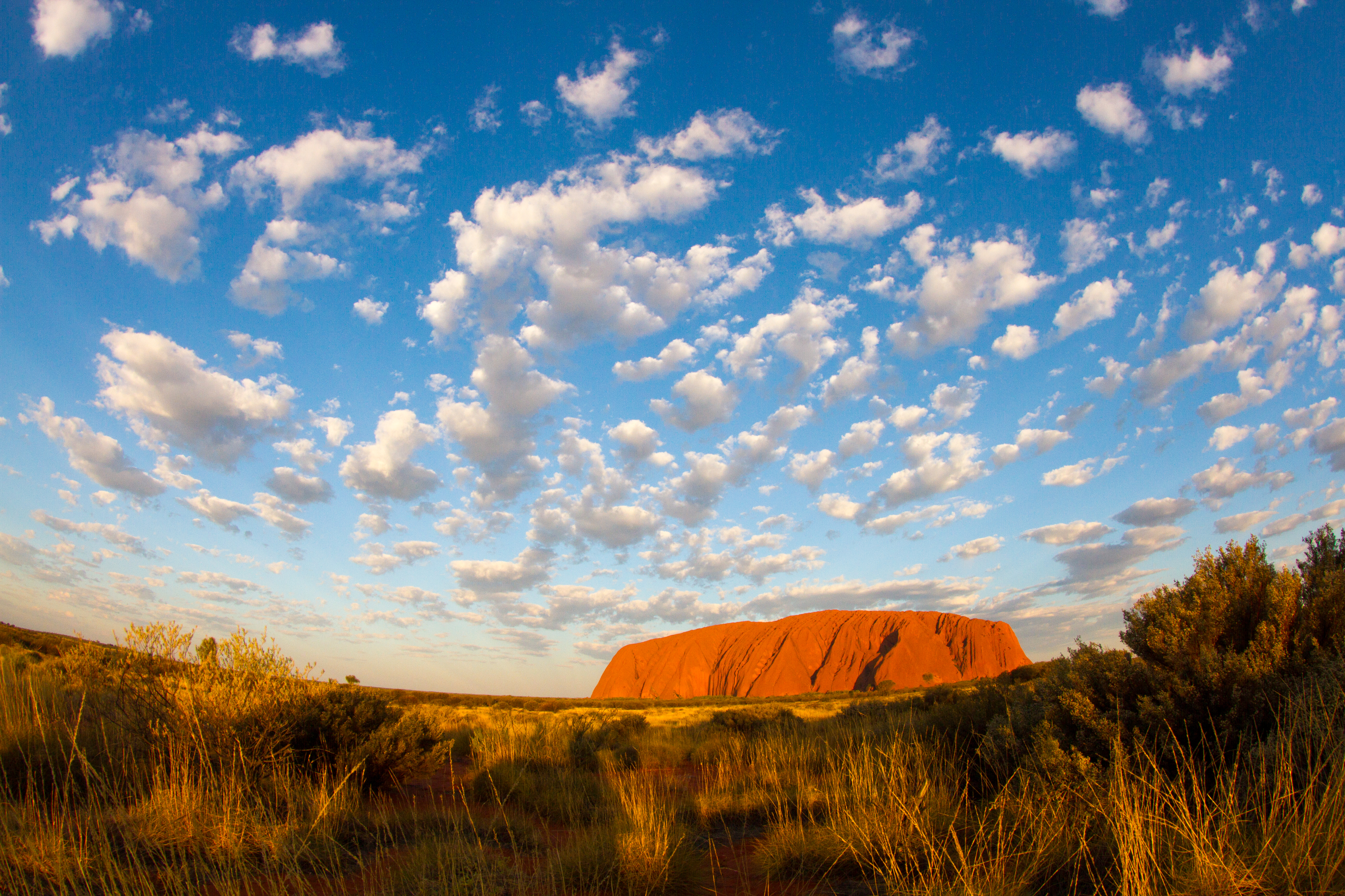 Puffy Clouds over Ayers Rock by Tchami