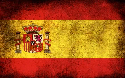 HD desktop wallpaper of the Spanish Flag with the coat of arms, featuring vibrant red and yellow colors with a vintage, worn texture.