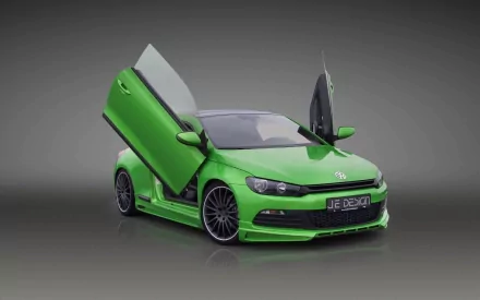 HD desktop wallpaper showcasing a vibrant green Volkswagen Scirocco with butterfly doors open against a smooth gray background.