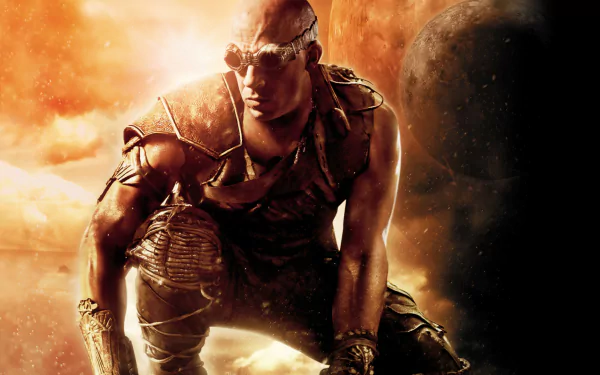 HD PC desktop wallpaper featuring a muscular character from the movie Riddick crouching with a fiery background and a large planet in the sky.