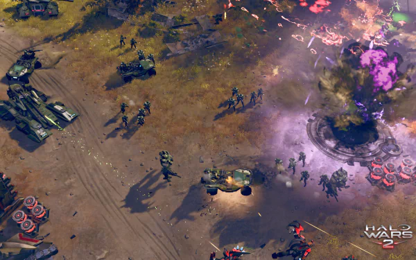 HD desktop wallpaper of a Halo Wars 2 battle scene with vehicles and troops engaged in combat on a rugged terrain.