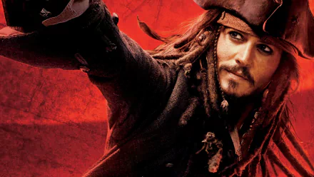 HD desktop wallpaper featuring Johnny Depp as Jack Sparrow in the movie Pirates of the Caribbean: At World's End, set against a vibrant red background.