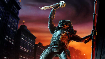 City Hunter (Predator) from the movie Predator 2 towers over a neon city skyline, HD PC desktop wallpaper and background showing the armored alien raising a skull-tipped spear.