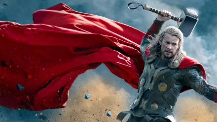 HD PC desktop wallpaper featuring Thor wielding his hammer with a flowing red cape, from the movie Thor: The Dark World.