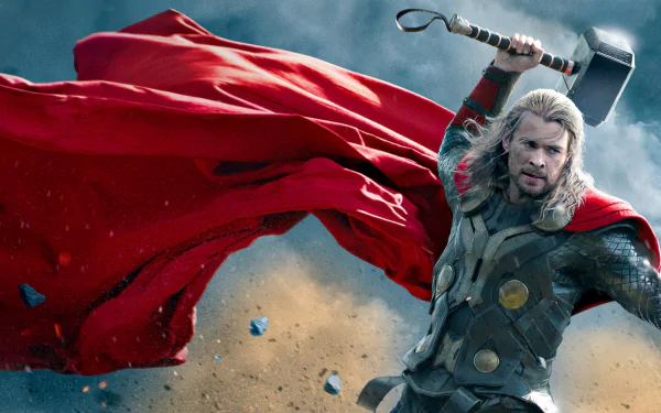HD PC desktop wallpaper featuring Thor wielding his hammer with a flowing red cape, from the movie Thor: The Dark World.