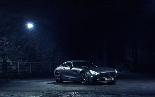 Silver Mercedes-Benz AMG GT car parked under a streetlight in a moody urban night scene — 4K Ultra HD PC desktop wallpaper background showcasing the performance vehicle.