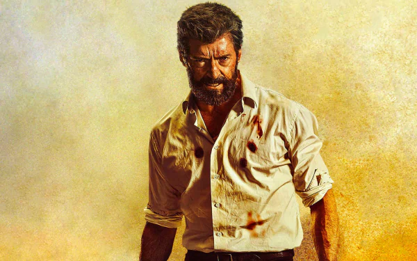 Hugh Jackman as Wolverine from the movie Logan, standing against a rugged background, shirt stained with blood. This HD desktop wallpaper captures the intense and gritty essence of the film.