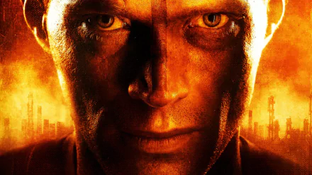 HD desktop wallpaper featuring Paul Bettany from the movie Priest, showcasing an intense close-up with a fiery, dramatic background.