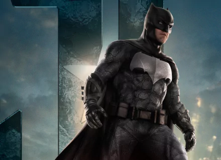 HD wallpaper featuring Ben Affleck as Batman from the Justice League movie, set against a dramatic sky background.