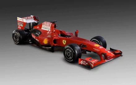 High-definition desktop wallpaper featuring a red Ferrari F60 Formula 1 race car on a gray gradient background.