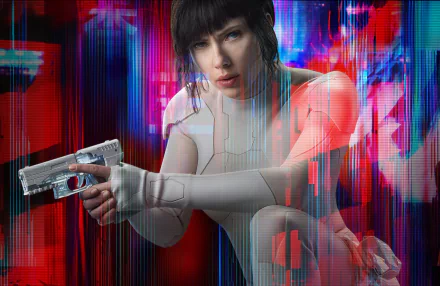 Scarlett Johansson in a futuristic suit, pointing a gun, amidst a vivid, neon background from the movie Ghost in the Shell (2017). This HD image serves as a striking desktop wallpaper and background.