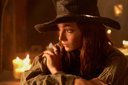 8K Ultra HD PC desktop wallpaper: candlelit portrait of a pensive pirate woman in a wide-brim hat, capturing the moody, period atmosphere of the TV show Black Sails.