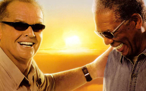 HD desktop wallpaper featuring Jack Nicholson and Morgan Freeman sharing a joyful moment from the movie The Bucket List against a warm sunset background.