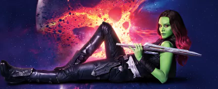 Zoe Saldana as Gamora from Guardians of the Galaxy Vol. 2 in an 8K Ultra HD wallpaper, set against a vibrant cosmic background.