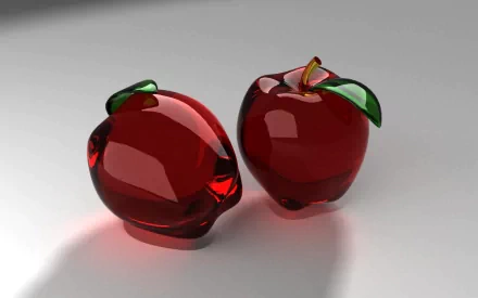 Artistic HD wallpaper featuring two glossy red apples with green leaves, set against a soft gray background, creating a fresh and vibrant food-themed aesthetic.
