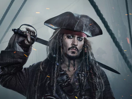 HD desktop wallpaper of Johnny Depp as Jack Sparrow from Pirates Of The Caribbean: Dead Men Tell No Tales, featuring the character with a sword on a ship amidst a dramatic backdrop.