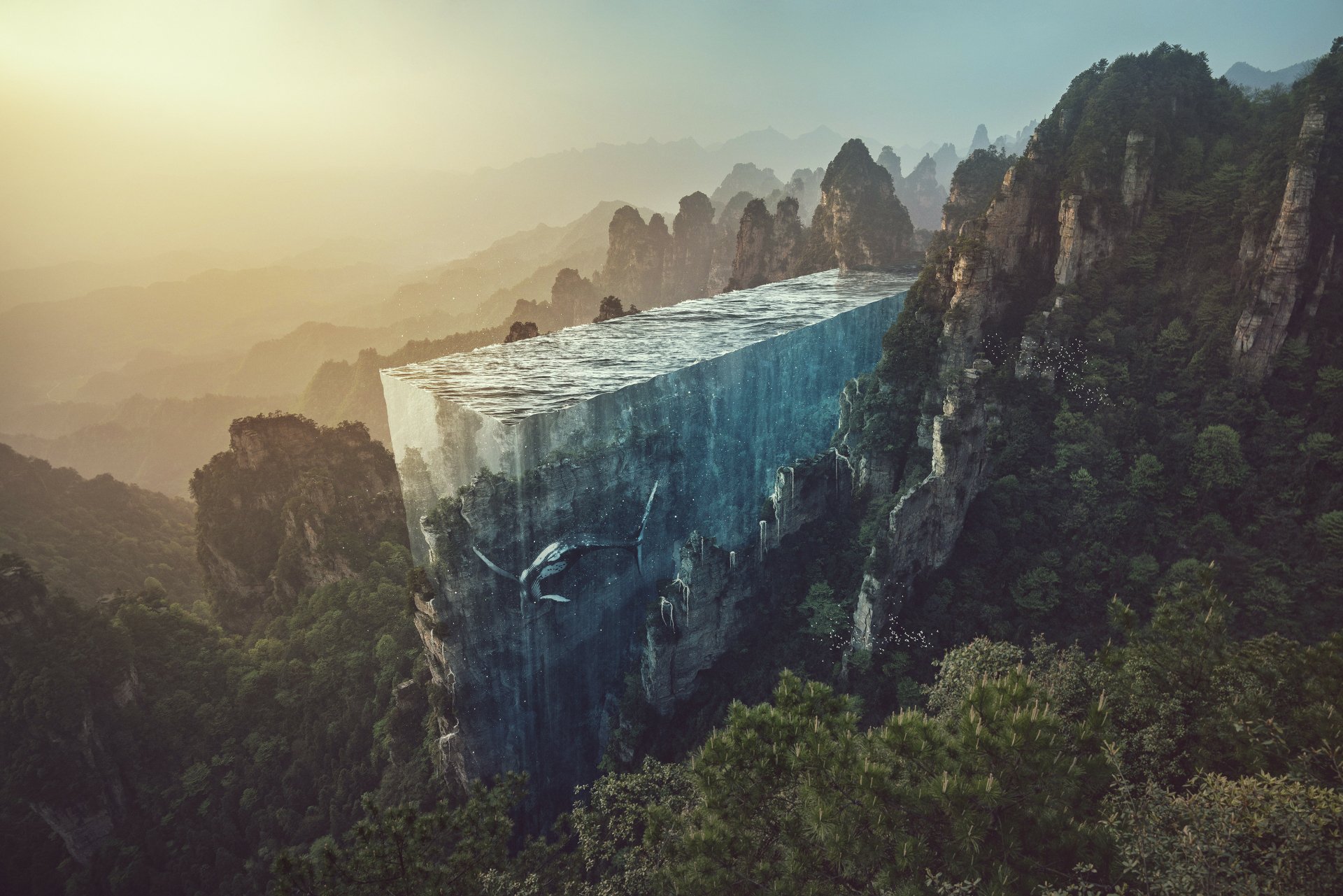 HD desktop wallpaper depicting a Sci-Fi landscape with a whale swimming in a massive suspended water body amidst rugged mountains, casting a surreal and otherworldly scene.