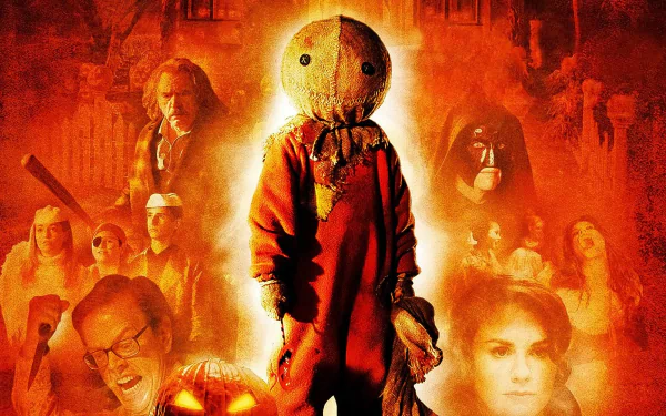 HD PC desktop wallpaper/background of Trick 'r Treat: burlap‑masked Sam in an orange jumpsuit centered against a fiery backdrop of other movie characters.