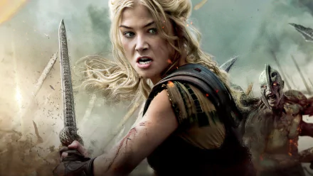 Andromeda from Wrath of the Titans, fierce and sword-raised amid battle smoke — HD PC desktop movie wallpaper.