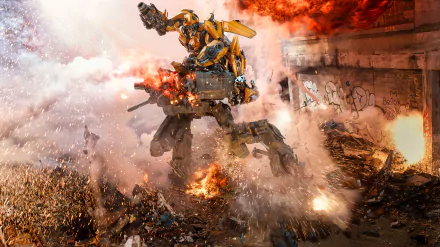 HD desktop wallpaper featuring Bumblebee from the movie Transformers: The Last Knight amidst intense fiery destruction, showcasing a dramatic battle scene.