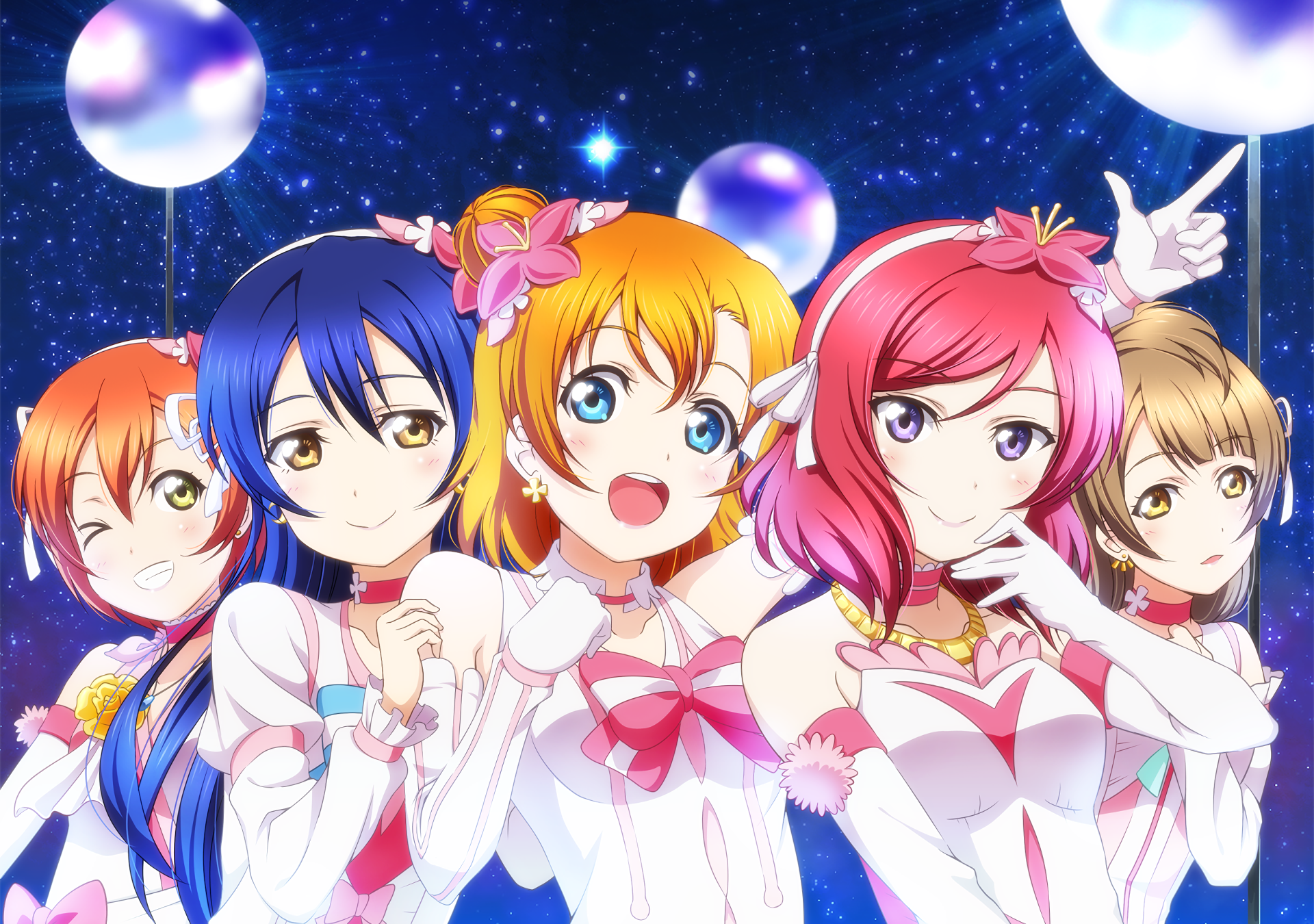 HD PC desktop wallpaper featuring Umi Sonoda, Maki Nishikino, Kotori Minami, Honoka Kousaka, and Rin Hoshizora from the anime Love Live! in vibrant, colorful outfits.