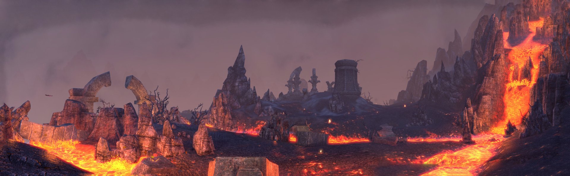 The Elder Scrolls Online video game HD PC desktop wallpaper: a volcanic wasteland with rivers of lava, charred ruins and looming towers.