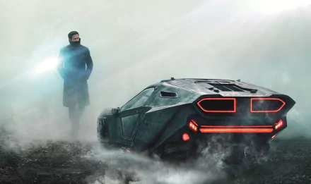 HD desktop wallpaper featuring Officer K, portrayed by Ryan Gosling, amidst a foggy landscape with a futuristic vehicle from the movie Blade Runner 2049.