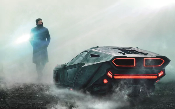HD desktop wallpaper featuring Officer K, portrayed by Ryan Gosling, amidst a foggy landscape with a futuristic vehicle from the movie Blade Runner 2049.