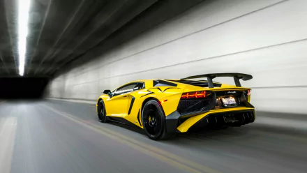 Yellow Lamborghini Aventador LP750-4 SV supercar speeding through a tunnel, rear three-quarter view — HD desktop wallpaper of the Lamborghini Aventador SV.
